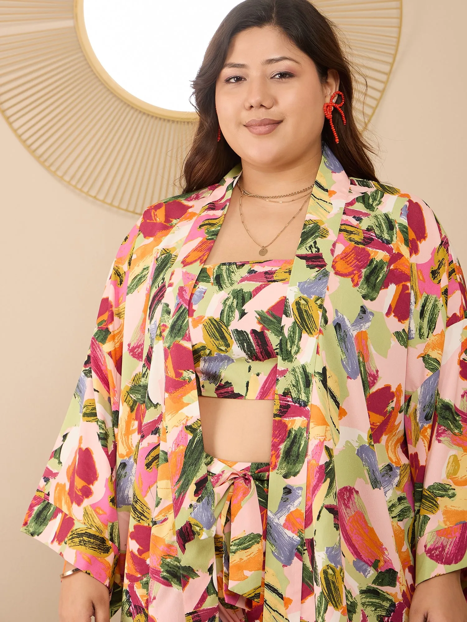Berrylush Curve Women Pink Printed Shoulder Straps Crop Top and Longline Shrug With Mini Shorts
