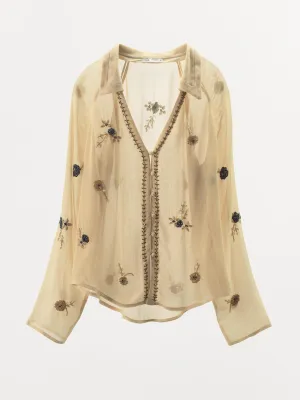 Contrasting beaded shirt