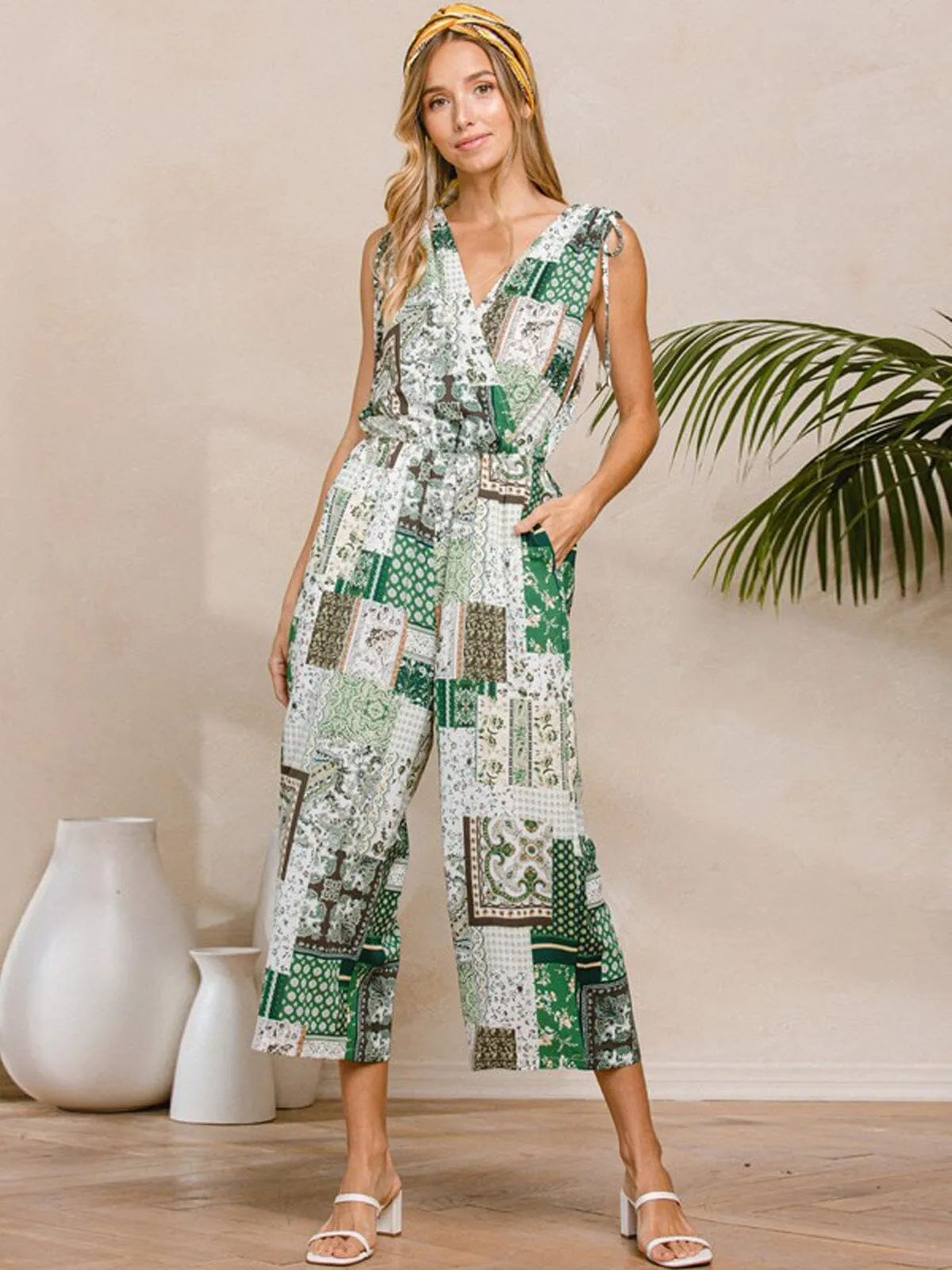 WOMEN'S SLEEVELESS V-NECK SURPLICE POCKETS MULTI PRINT JUMPSUIT