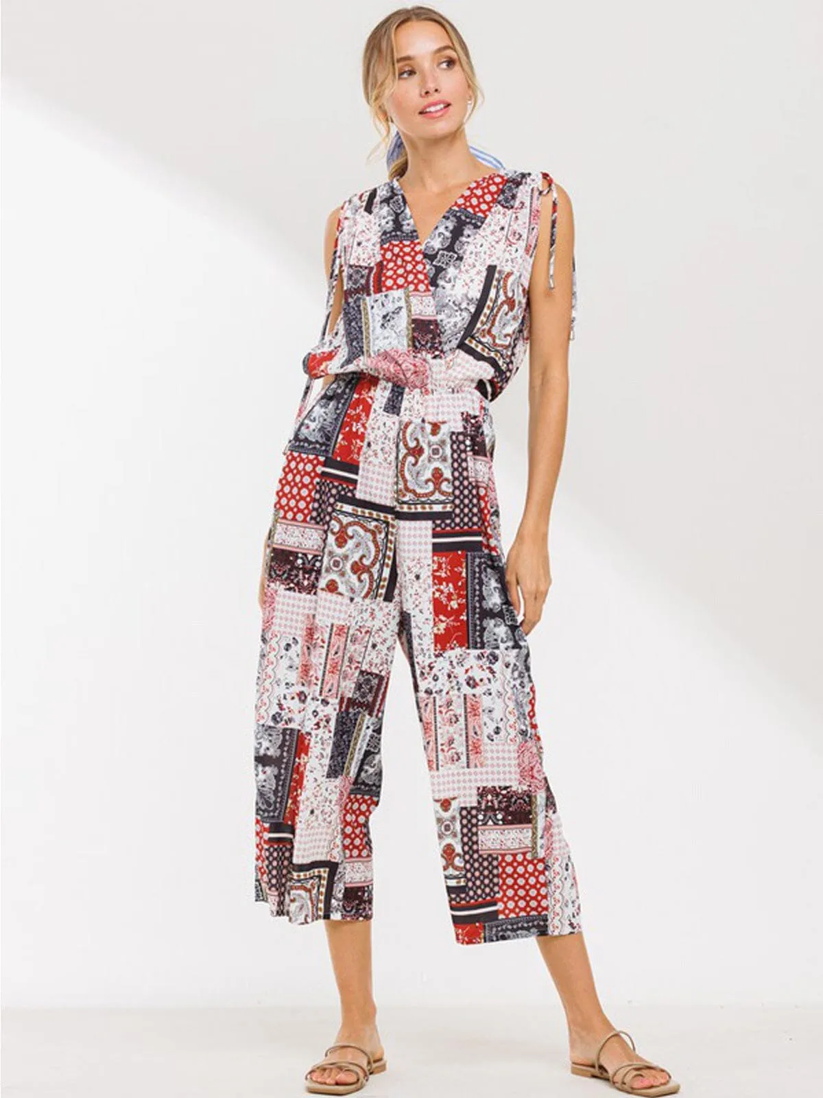WOMEN'S SLEEVELESS V-NECK SURPLICE POCKETS MULTI PRINT JUMPSUIT